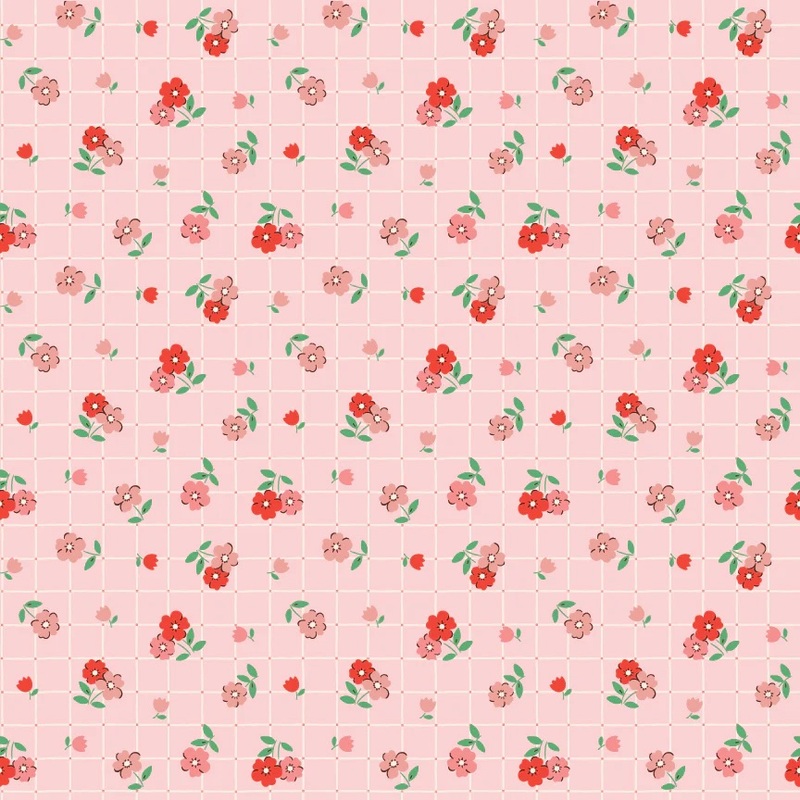 Pink fabric featuring a grid pattern covered in small red and pink florals.