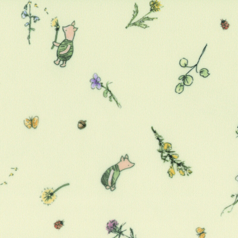 Pastel green minky fabric with illustrations of Piglet and tossed floral sprigs.