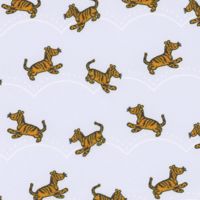Pastel lilac minky fabric with illustrations of tigger bouncing on a scalloped background.