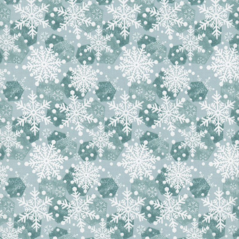 Pattern of white snowflakes on a light teal fabric with teal-hued geometric shapes and white stylized snowflakes.