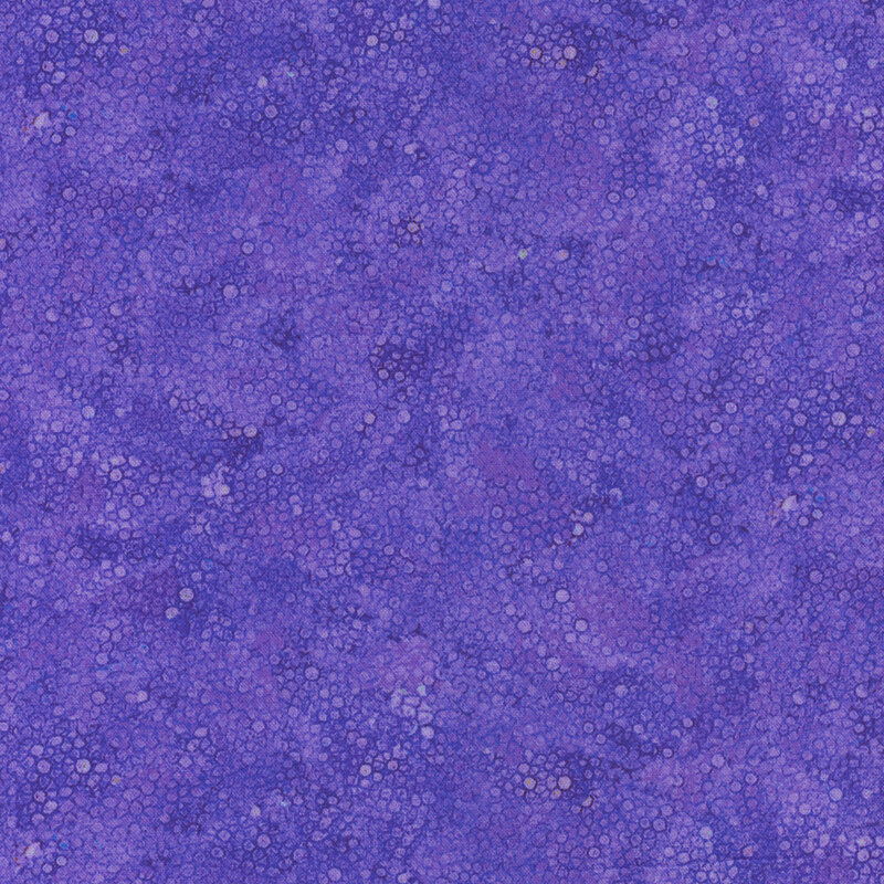 A textured pattern of deep purple with subtle variations and speckles throughout.
