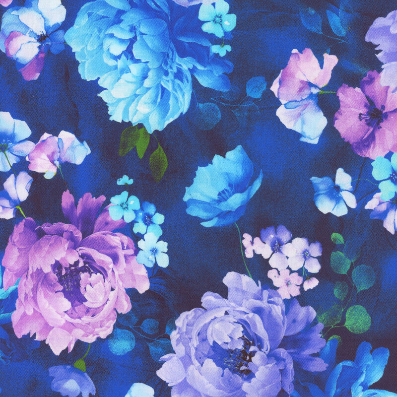 A vibrant floral pattern featuring blue, purple, and teal flowers on a dark blue fabric.