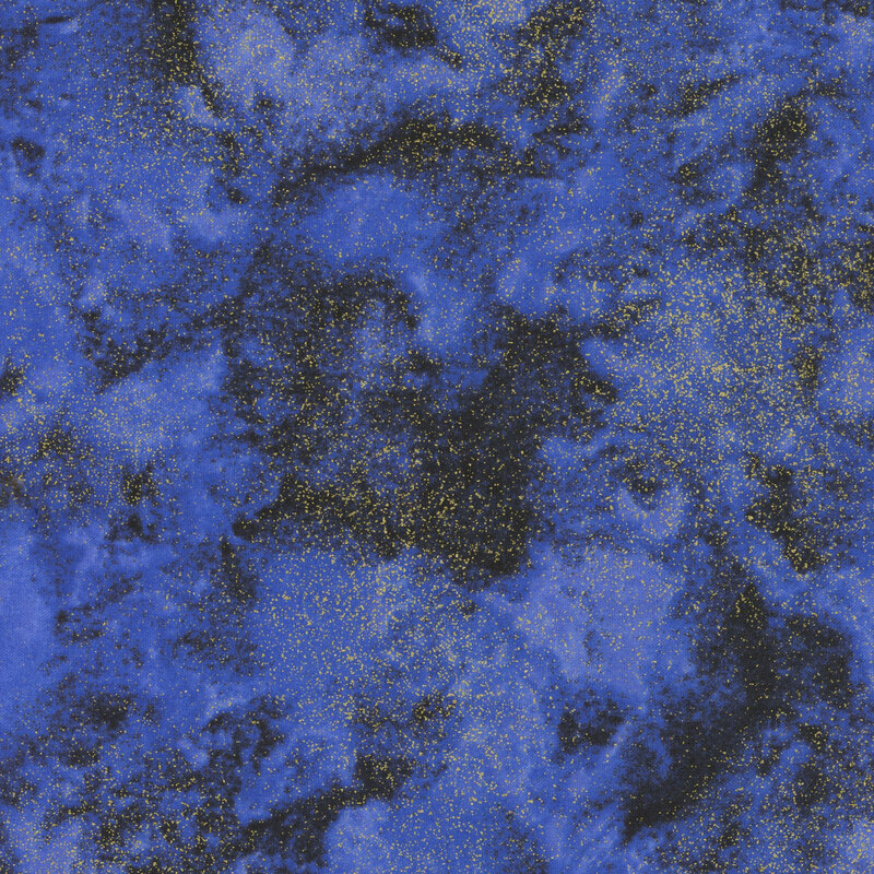 Blue mottled fabric with scattered golden highlights.