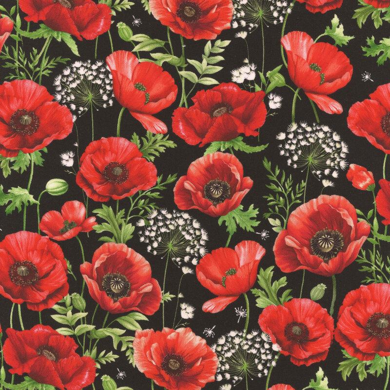 A pattern of vibrant red poppies interspersed with white flowers on a black fabric.