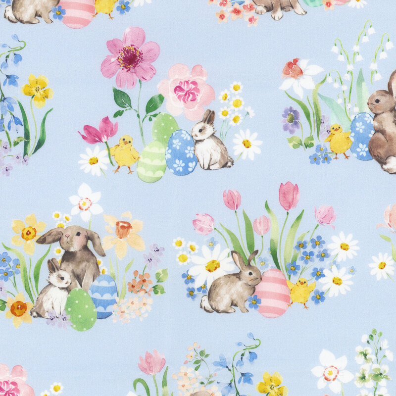 Fabric pattern with watercolor bunnies and flowers on a light blue background, featuring Easter eggs.