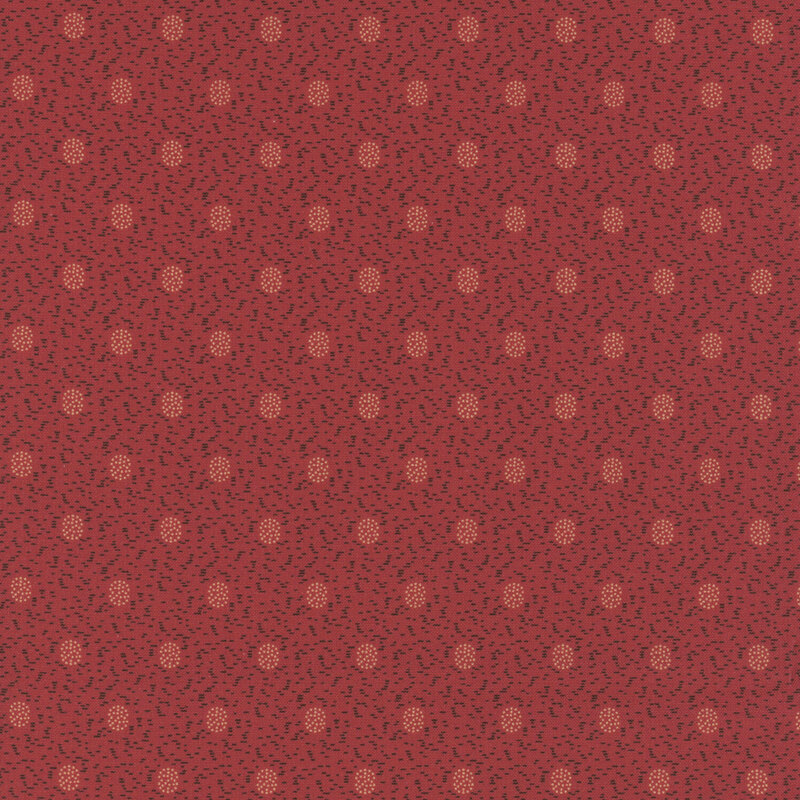 Rich red fabric with neat rows of dotted ovals on a textured background.