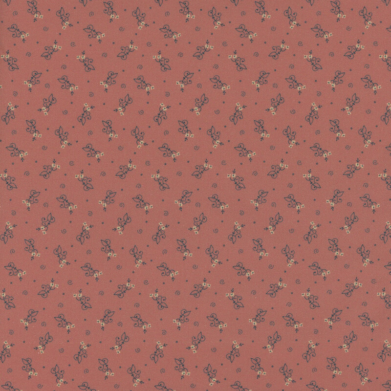 Dusty pink fabric with abstract ditsy floral shapes and swirls.