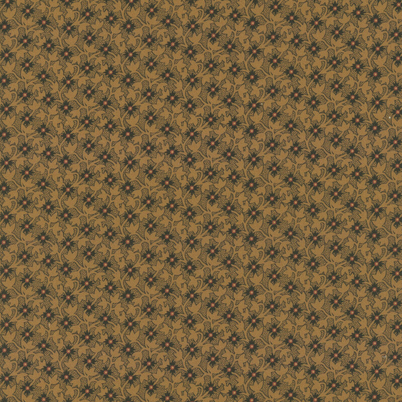 Gold fabric with diagonal rows of black flowers on a tonal leafy background.