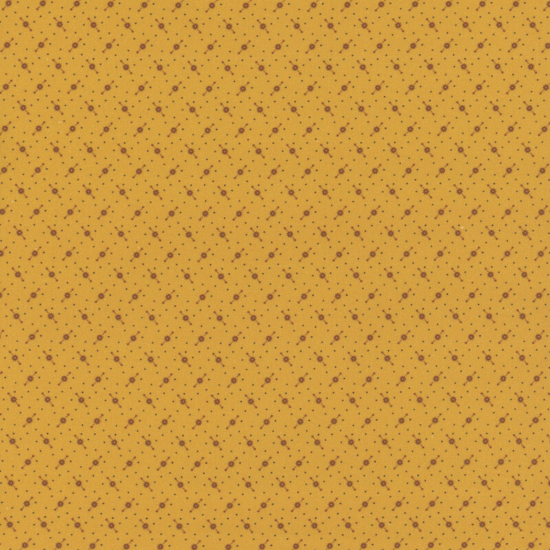 Gold-yellow fabric with alternating rows of abstract dotted lines.