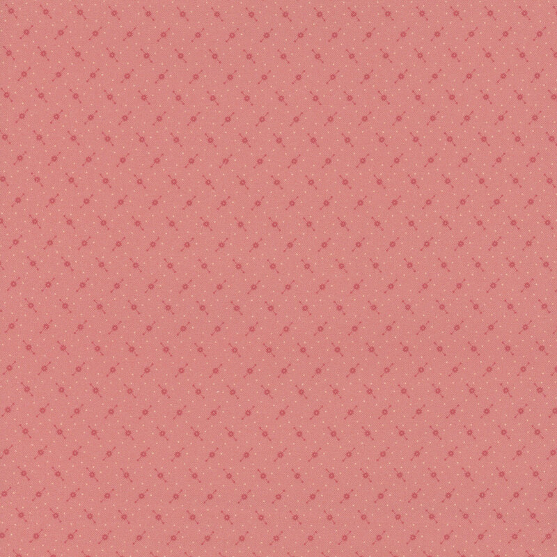 Pink fabric with alternating rows of tonal abstract dotted lines.