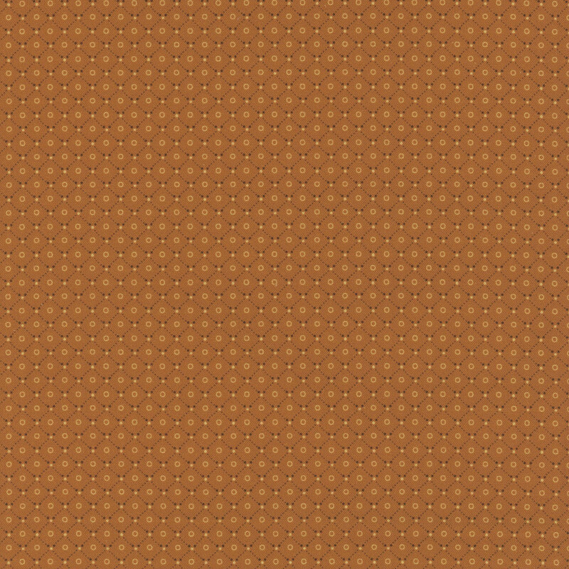 Orange fabric featuring a lattice design with small rings in the middle of each.