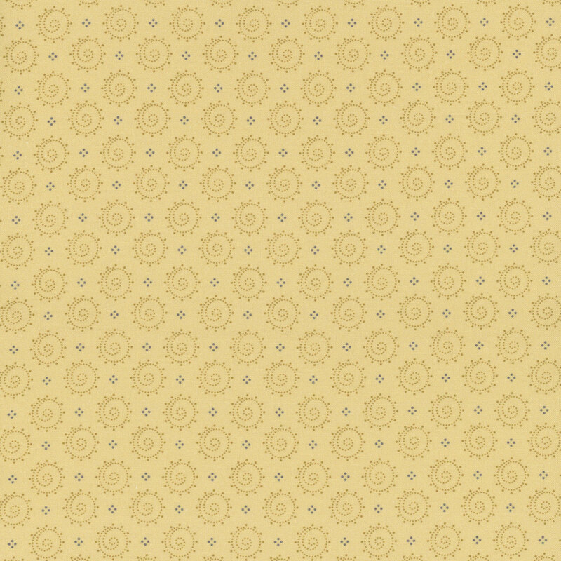 Light tan fabric with a design of dotted circles with swirling centers.