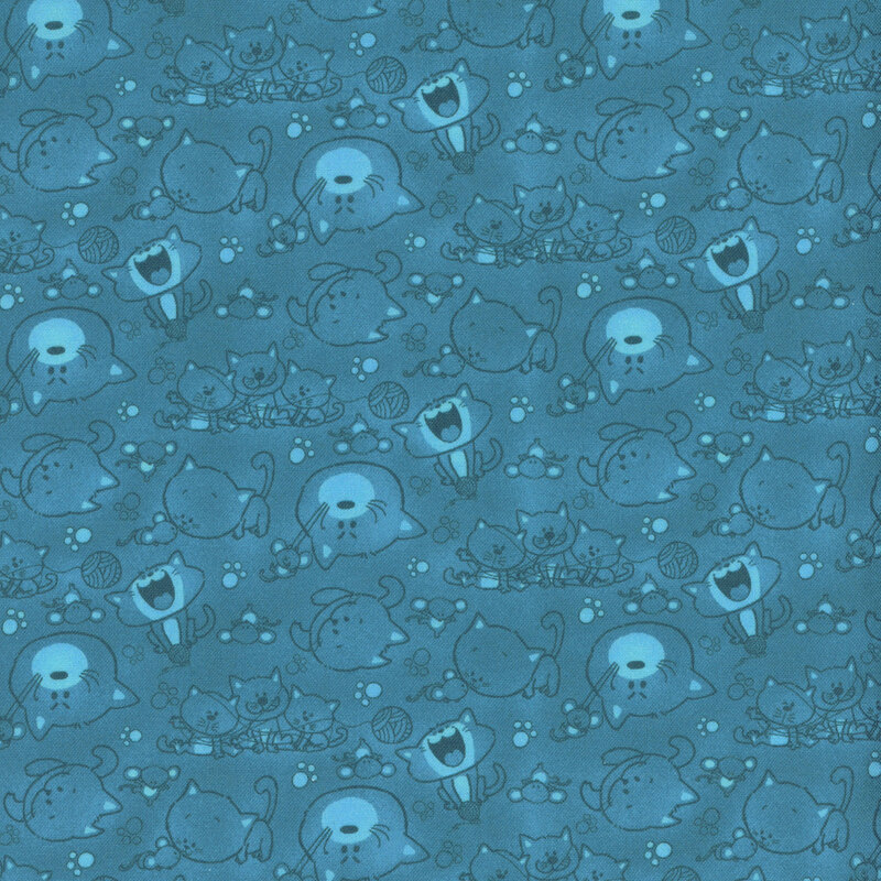 Mottled blue fabric with tonal outlined images of cartoon cats.