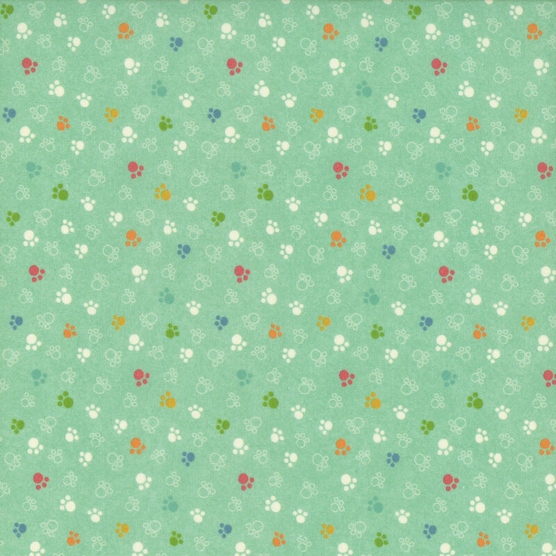 Light teal fabric with ditsy outlined and colorful paw prints.