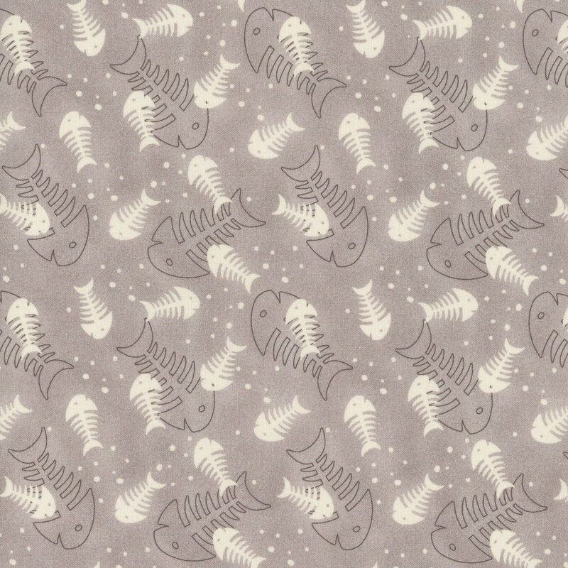 Ash gray fabric with a design of tossed fishbones and scattered dots.