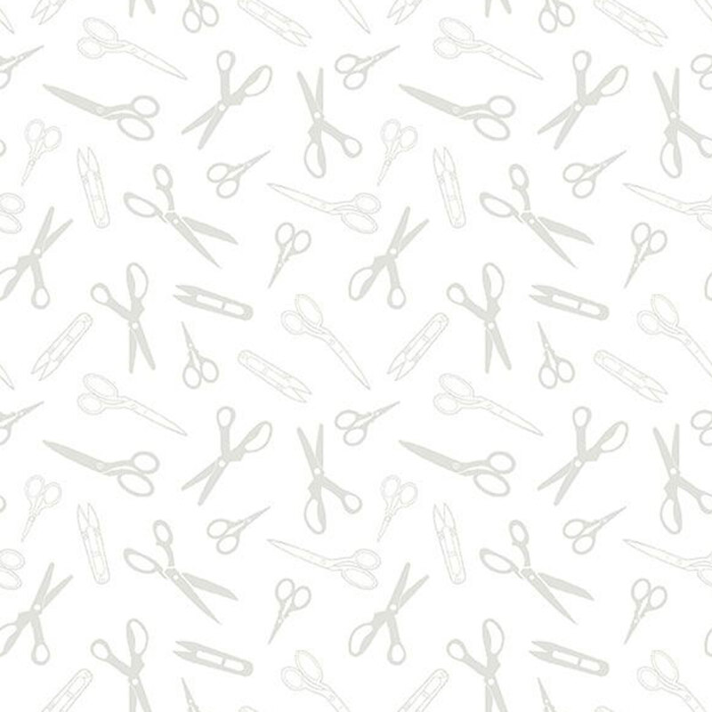 Digital scan of a white-on-white fabric with various scissors made for cutting fabric.