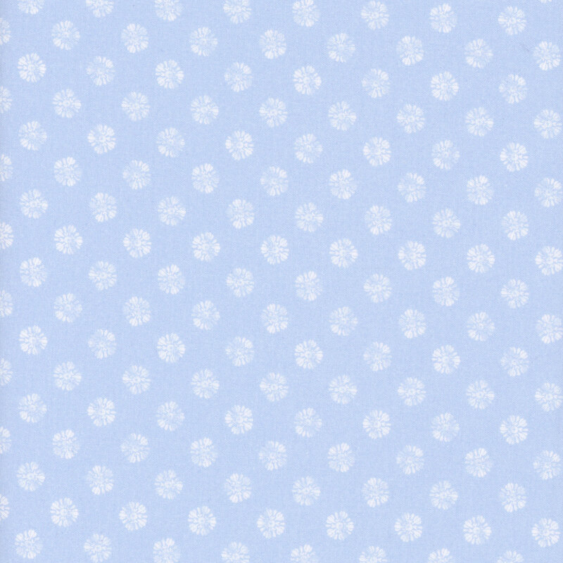 Light blue fabric with a repeated pattern of small white floral shapes.