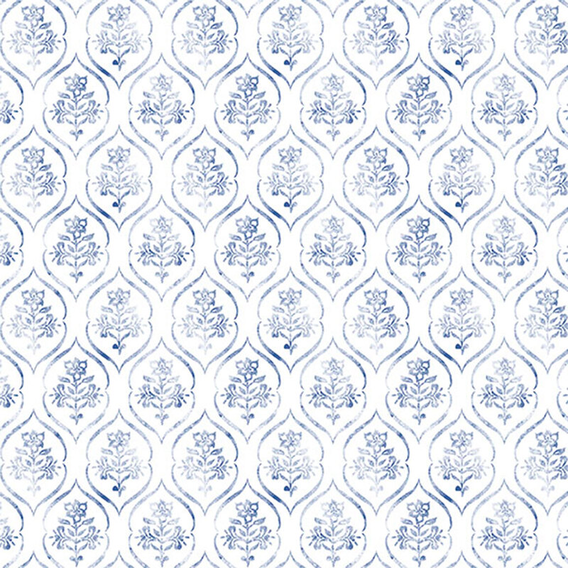 White fabric with a blue ornamental floral design.