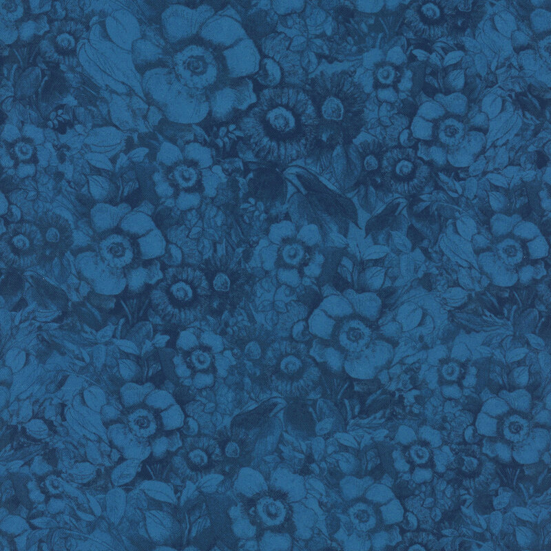 Darker blue fabric with a tonal design of flowers.