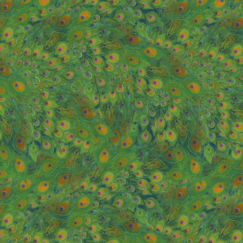 Fabric featuring peacock feathers in shades of green, blue, and yellow.