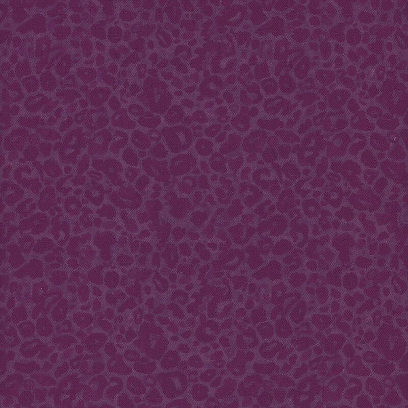 Tonal purple fabric featuring a subtle, leopard print pattern.