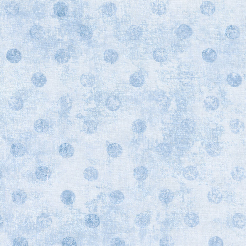 Light blue textured background with scattered darker blue polka dots.
