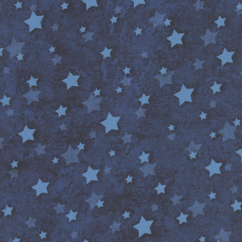 Dark blue fabric with tonal, lighter blue scattered stars.