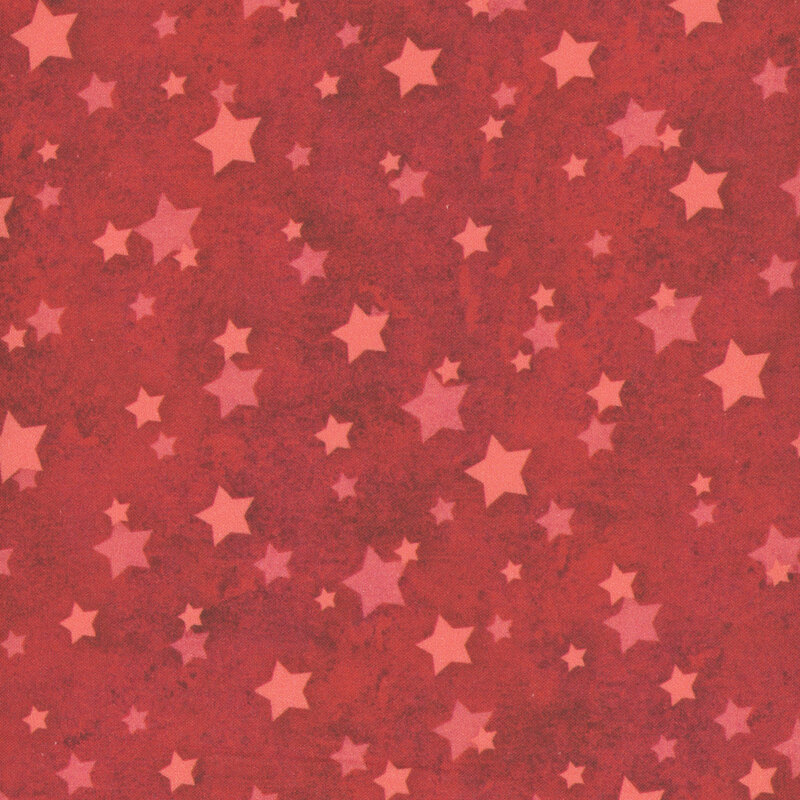 Red fabric with tonal, light red scattered stars.