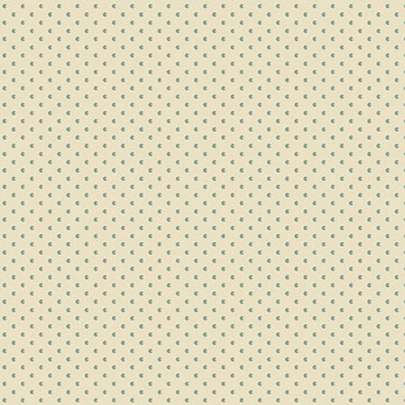 Cream fabric with tiny, blue textured shapes.