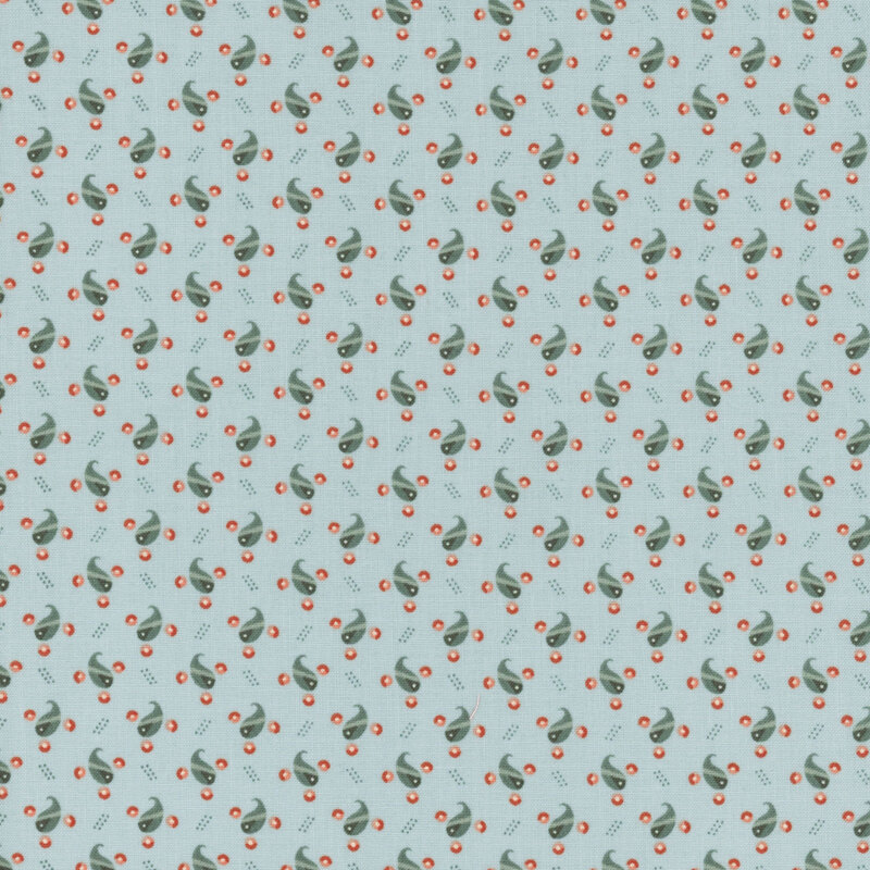 Light blue fabric with teal teardrop shapes amongst textured design and small orange dots.
