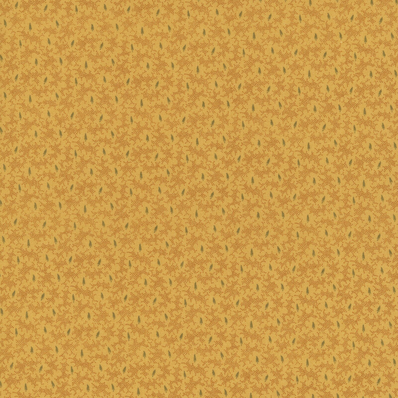 Yellow fabric with a abstract leaf pattern.