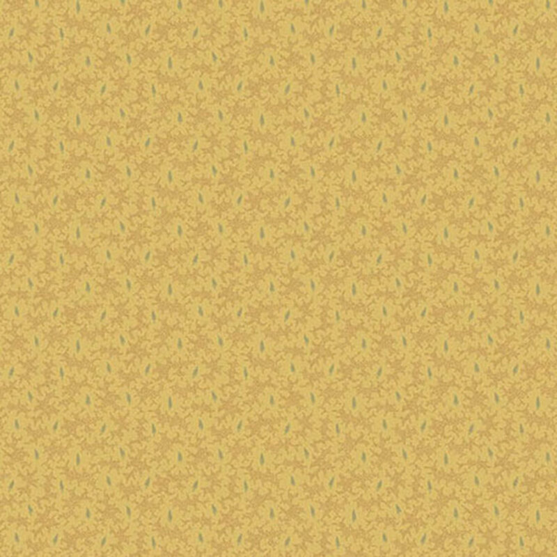 Yellow fabric with a tonal abstract leaf pattern and muted blue accents.