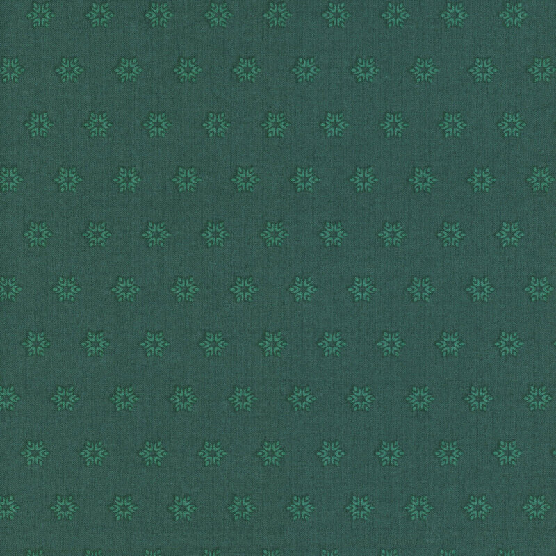 A teal blue fabric with tonal aqua starbursts.