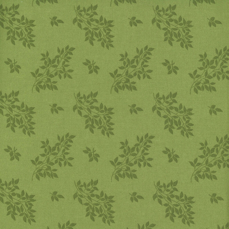 A leaf green fabric with tonal tossed leaf clusters.