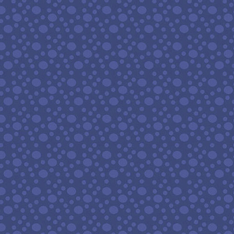 An iris blue fabric with large and small tonal dots.