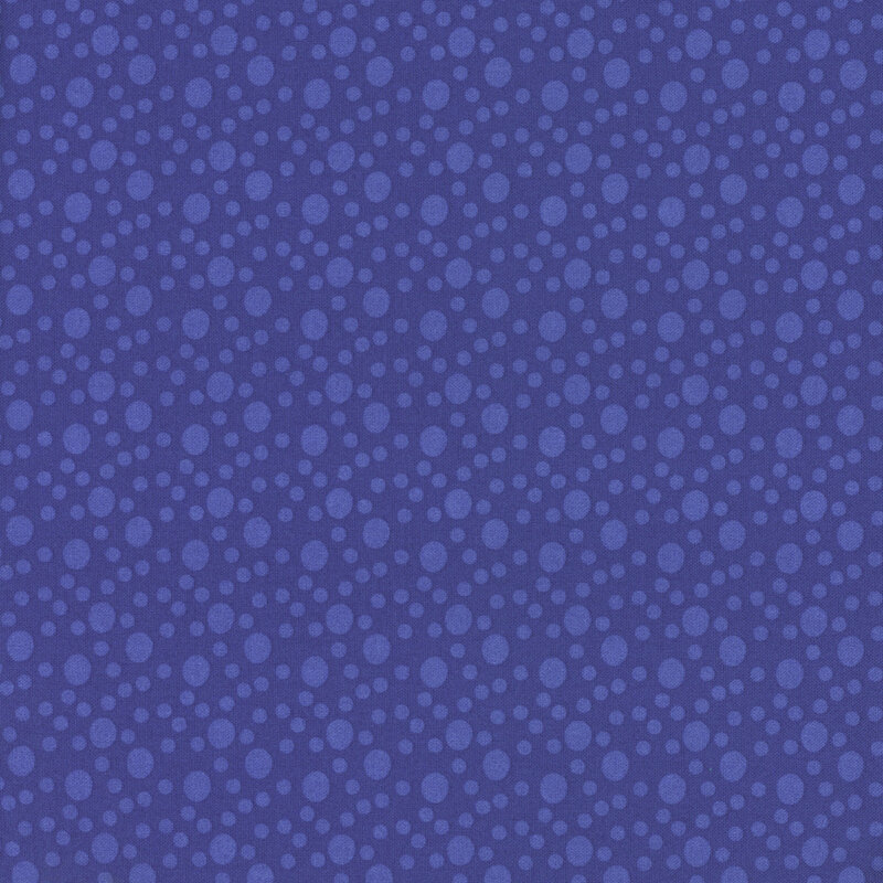 An iris blue fabric with large and small tonal dots.