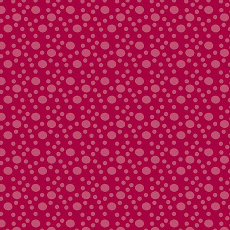 A bright candy red fabric with large and small tonal dots.