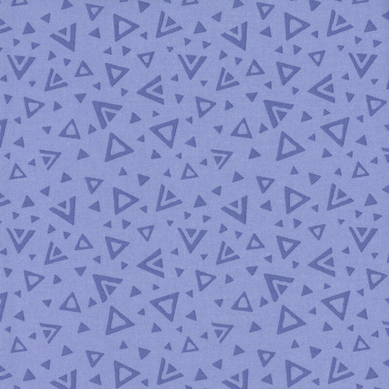A periwinkle blue fabric with tossed open and closed tonal triangles.