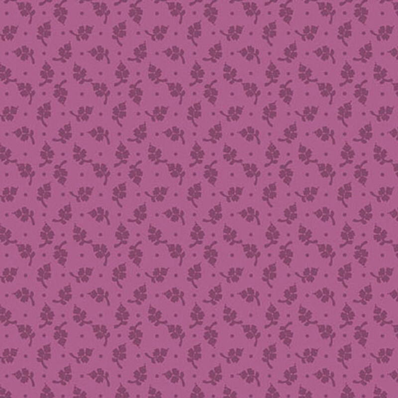 An orchid pink fabric with a tonal, primitive, ditsy leaf and dot design.