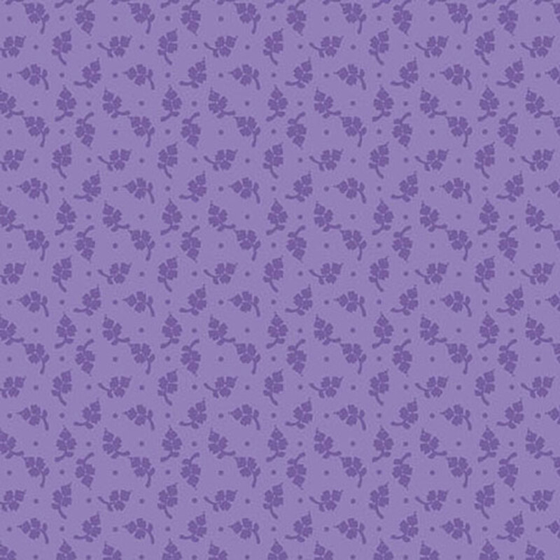 An iris blue fabric with a tonal, primitive, ditsy leaf and dot design.