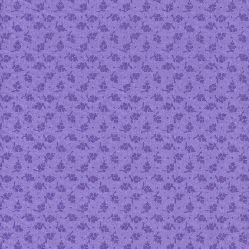 An iris blue fabric with a tonal, primitive, ditsy leaf and dot design.