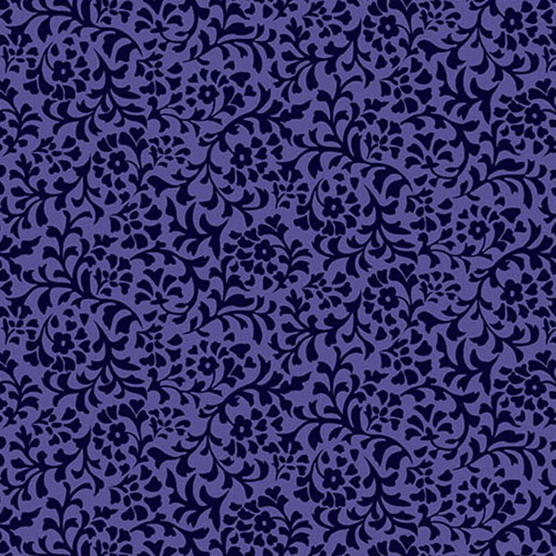 An iris blue fabric with a dense pattern of dark blue flower and leaf silhouettes.