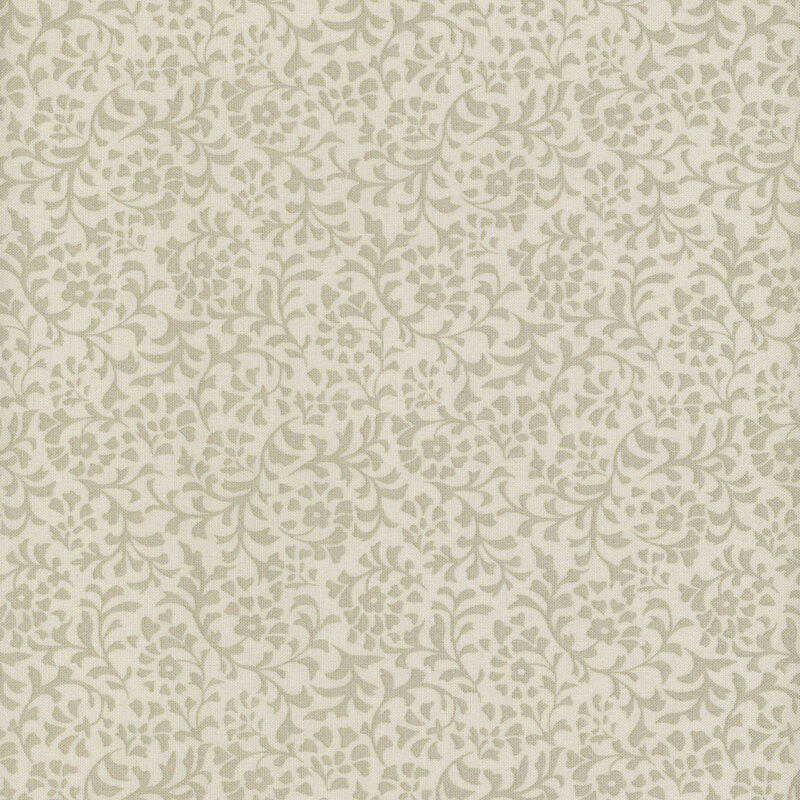 A beige fabric with a dense pattern of tonal flower and leaf silhouettes.
