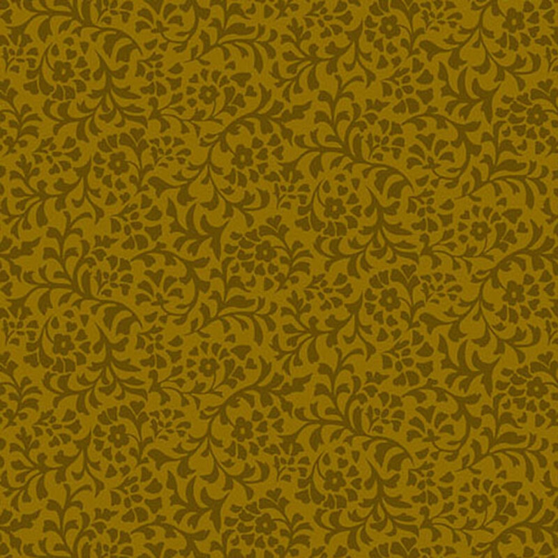 A mustard yellow fabric with a dense pattern of tonal flower and leaf silhouettes.