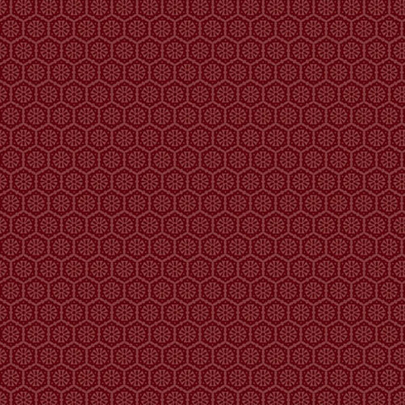 A mahogany fabric with a tonal pattern of tiled geometric emblems.