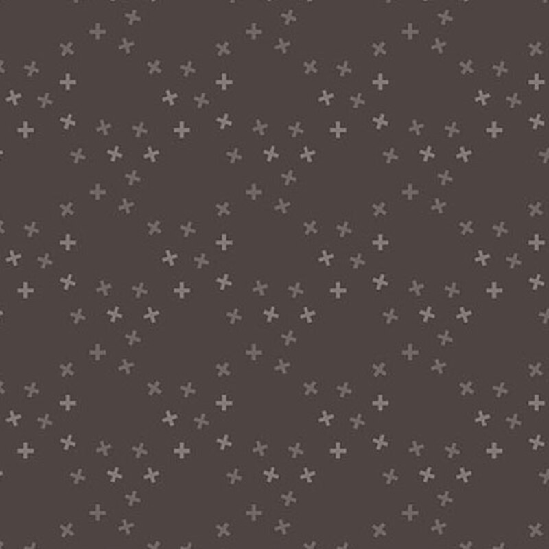 A slate gray fabric with tossed tonal x's in a large lattice pattern.