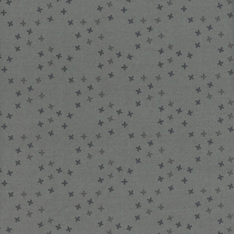 A medium gray fabric with tossed tonal x's in a large lattice pattern.