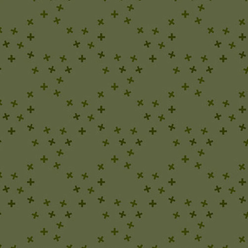 An herb green fabric with tossed tonal x's in a large lattice pattern.