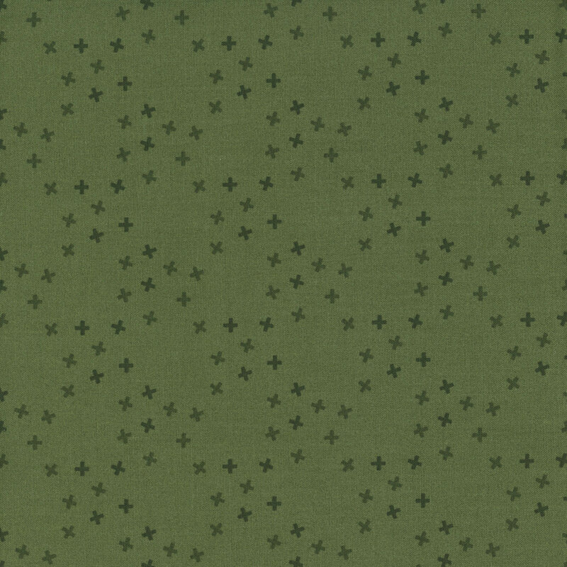 An herb green fabric with tossed tonal x's in a large lattice pattern.