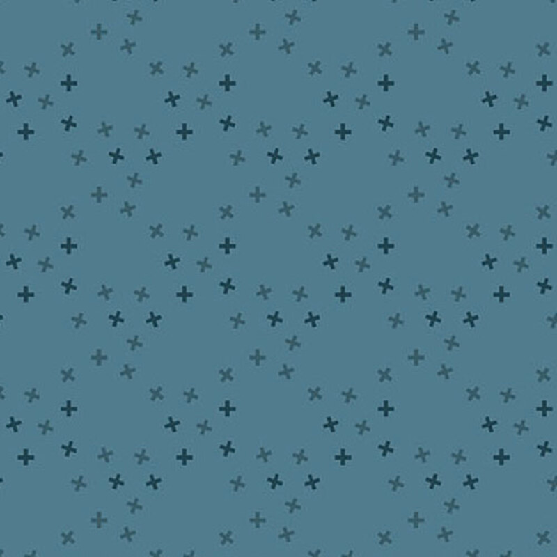 A teal blue fabric with tossed tonal x's in a large lattice pattern.